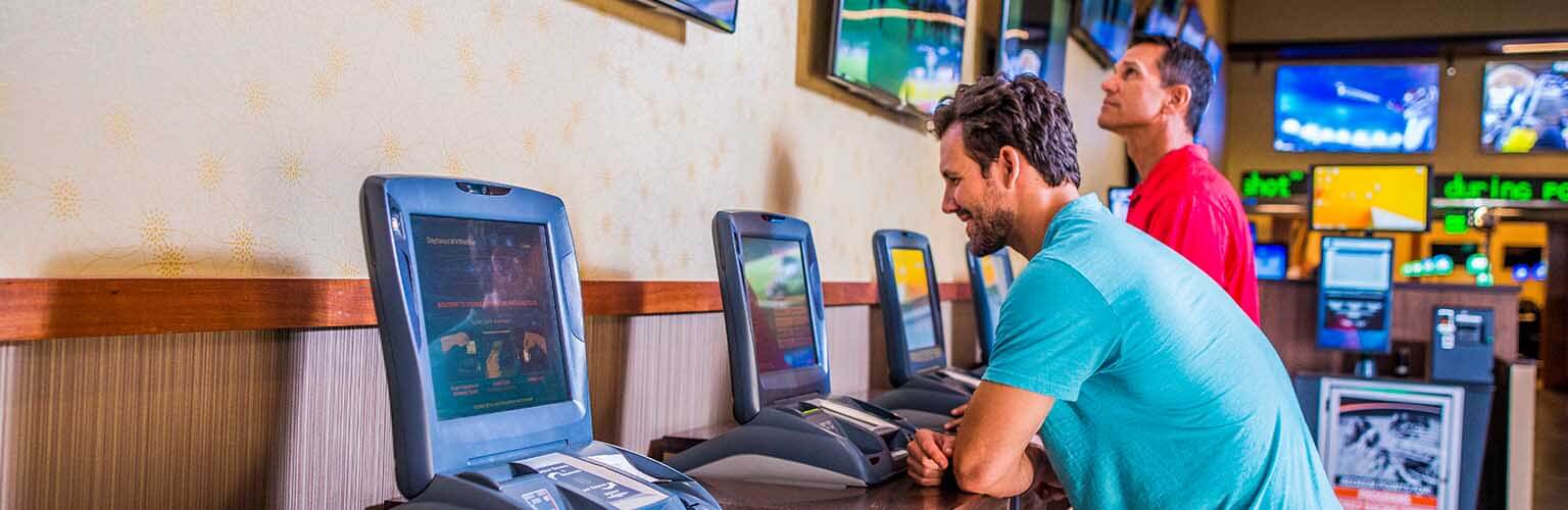 Guys at Simulcast Wagering Machines